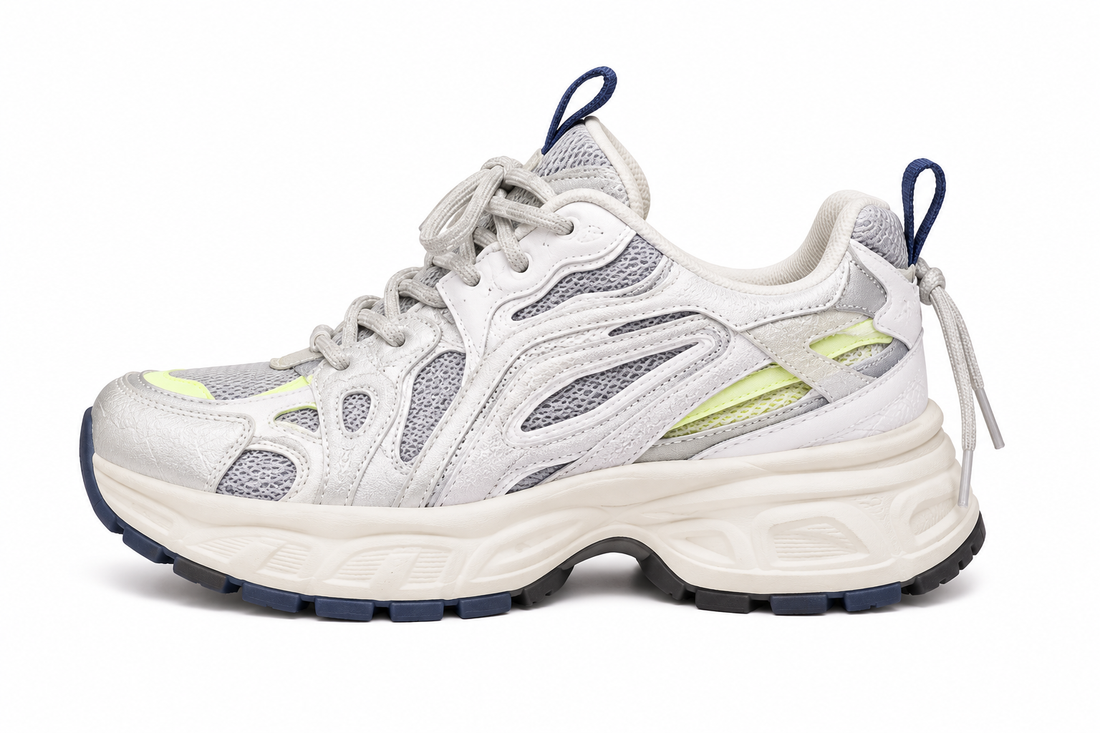 Women's silver gray chunky running sneakers with breathable mesh upper and cushioned sole.