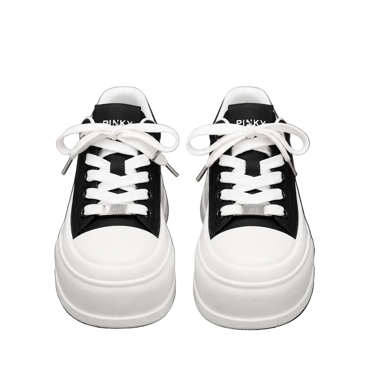Women's black and white platform sneakers with thick sole and lace-up design.