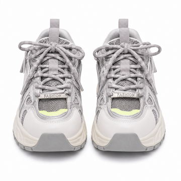 Women's light gray chunky running sneakers with breathable mesh upper and cushioned sole.