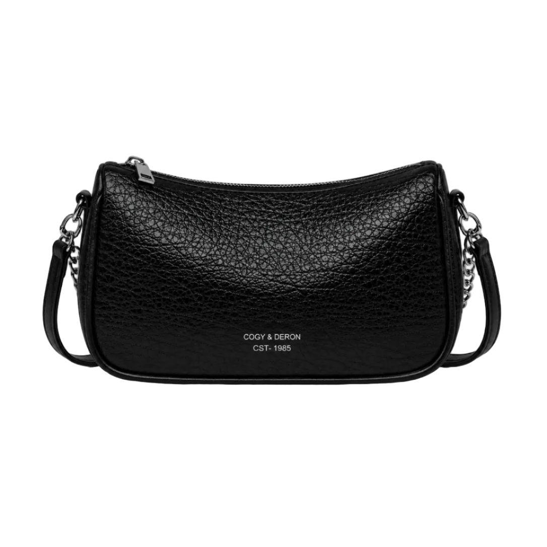 Front view of a black textured shoulder bag with silver chain accents and a curved silhouette, photographed in a professional studio on a clean white background.