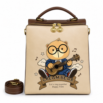 Beige and brown square backpack featuring a Cream Bear character playing a guitar, with a top handle, detachable shoulder strap, and gold-tone hardware.