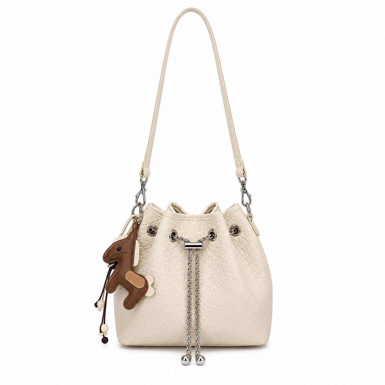 Front view of a white textured bucket shoulder bag with silver chain drawstring details and a brown horse charm, photographed in a professional studio on a clean white background.