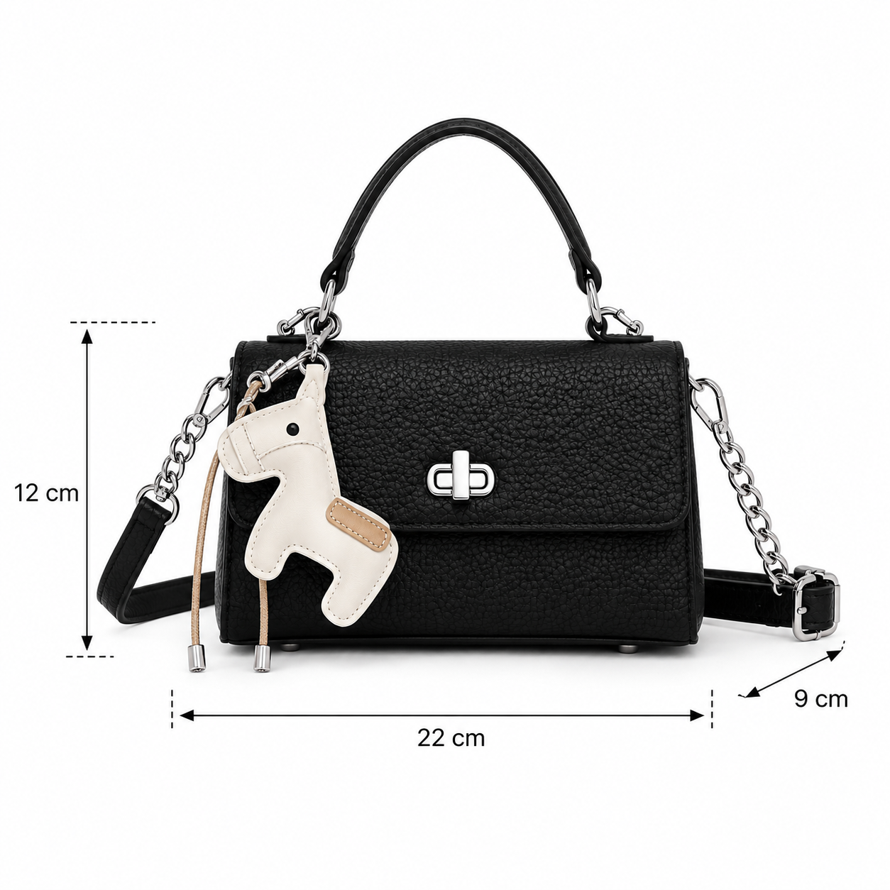 Black pebbled leather handbag with top handle, silver chain strap, and a cream horse-shaped keychain charm. Measurement annotations show 12 cm height, 22 cm width, and 9 cm depth on a white background.