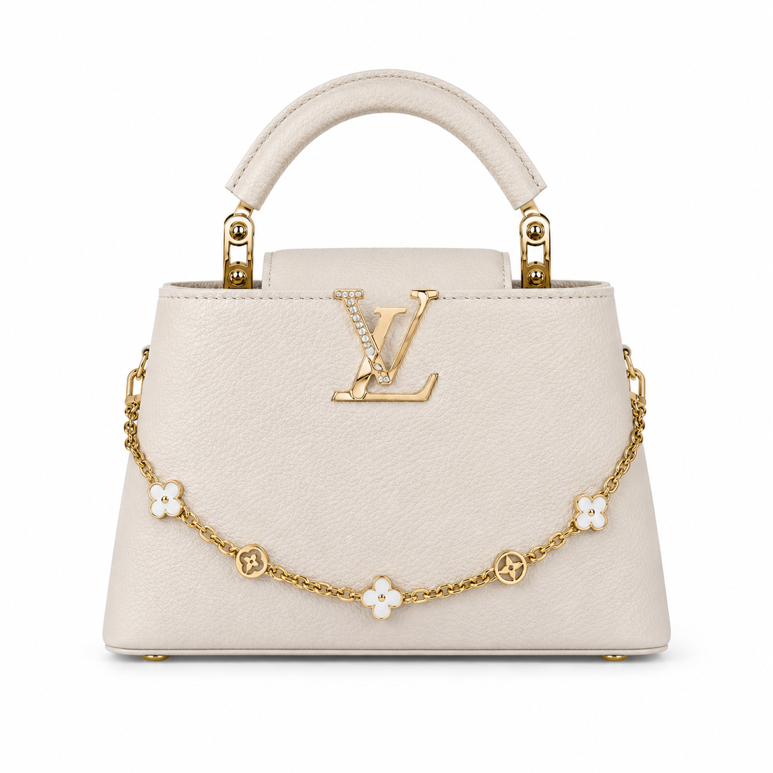 Louis Vuitton Capucines large cream leather handbag with pearl-detailed gold LV logo, floral gold charm chain, structured top handle, and elegant luxury designer styling.
