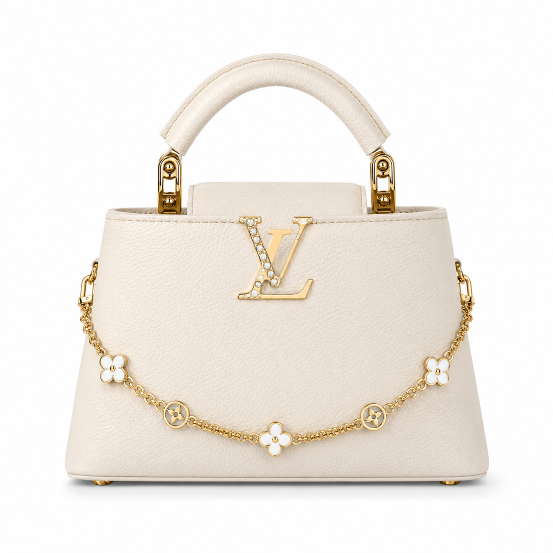 Louis Vuitton Capucines small ivory leather handbag with pearl-detailed gold LV logo, floral gold charm chain, structured top handle, and luxury designer styling.