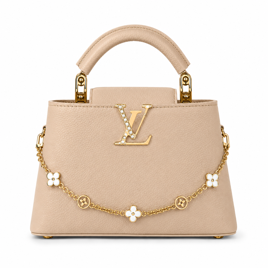 Louis Vuitton Capucines medium beige leather handbag with pearl-detailed gold LV logo, floral gold charm chain, structured top handle, and luxury designer styling