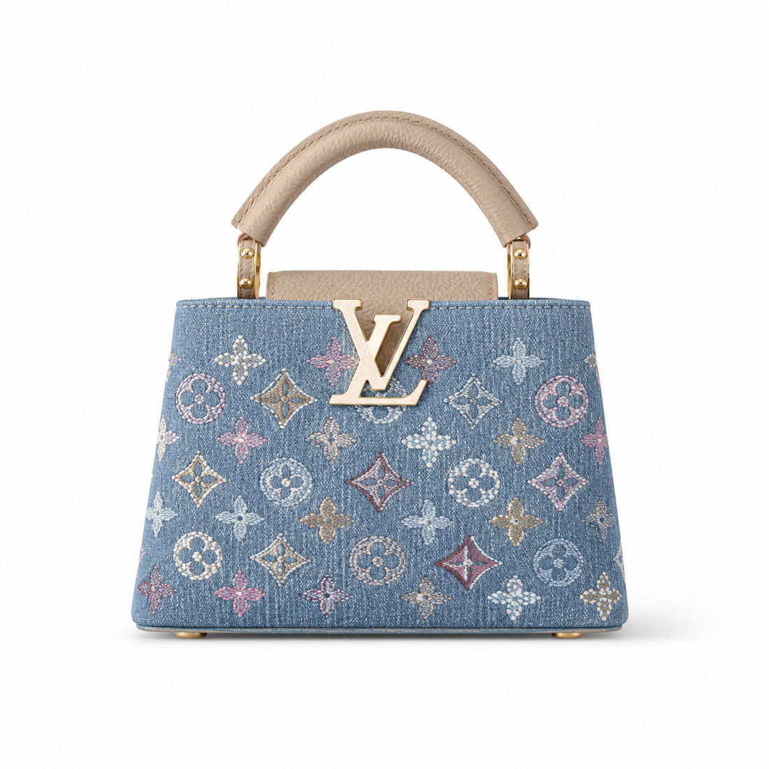Louis Vuitton Capucines small blue denim monogram handbag with beige leather handle, gold LV logo, structured silhouette, and luxury designer styling.