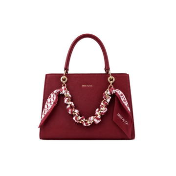 MISS ALITA structured burgundy tote handbag featuring a gold-tone chain wrapped with a matching printed scarf, elegant top handles, and a spacious everyday design.