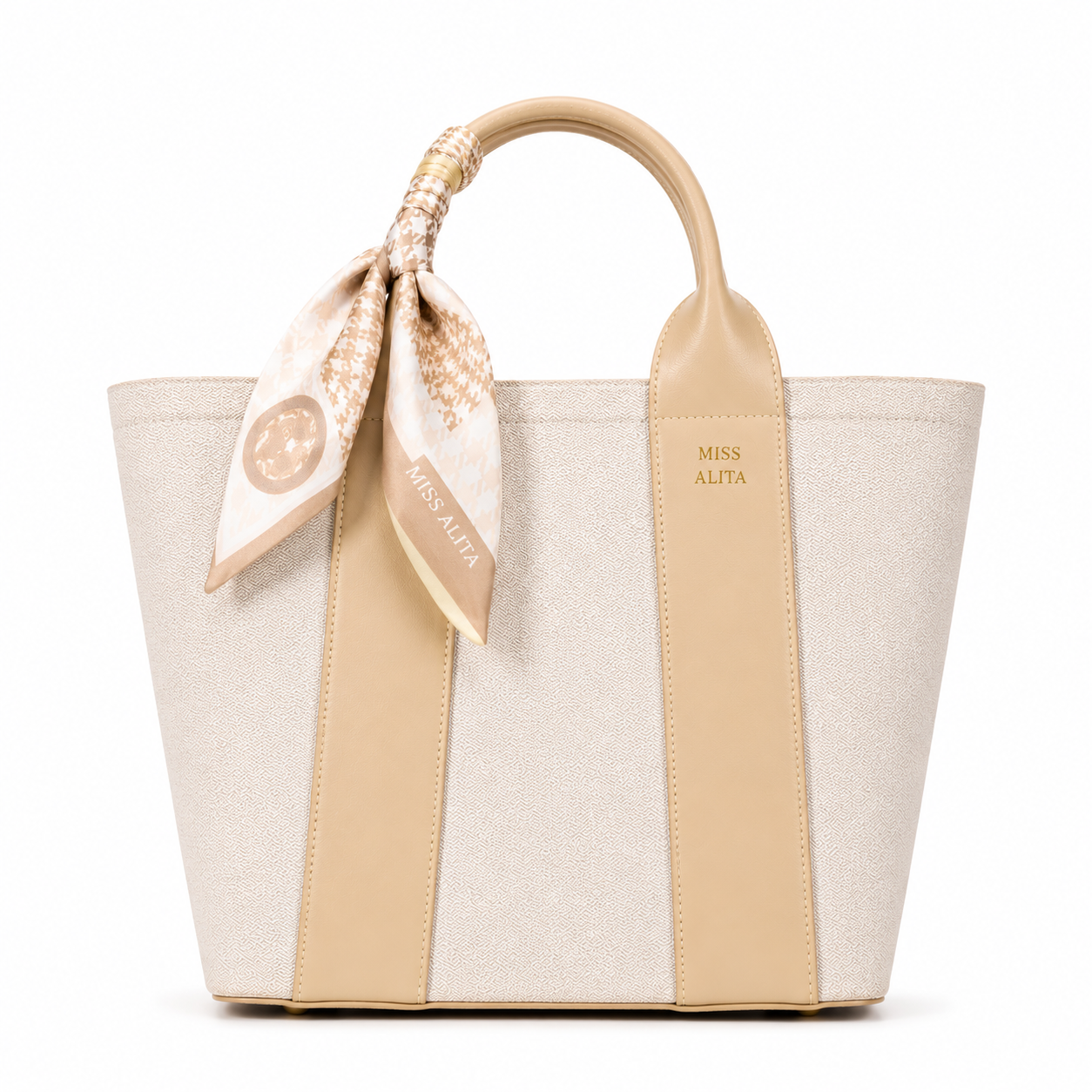 MISS ALITA apricot canvas tote handbag with leather trim, decorative silk scarf handle, and structured design on a white background.