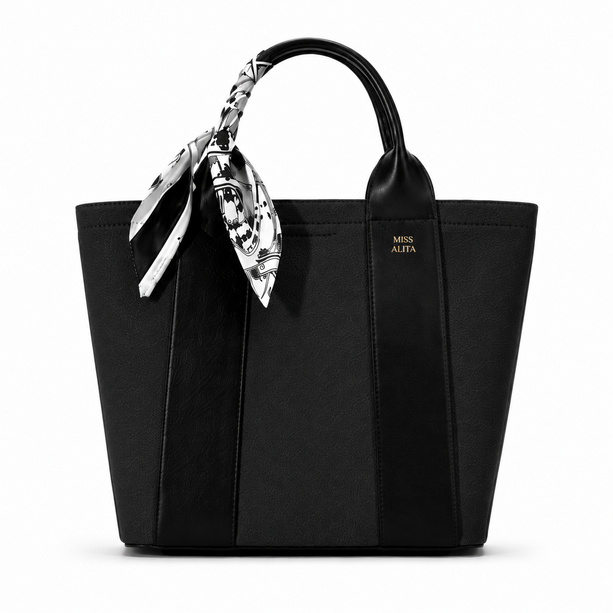 MISS ALITA black canvas tote handbag with leather trim, decorative black and white silk scarf handle, and structured design on a white background.