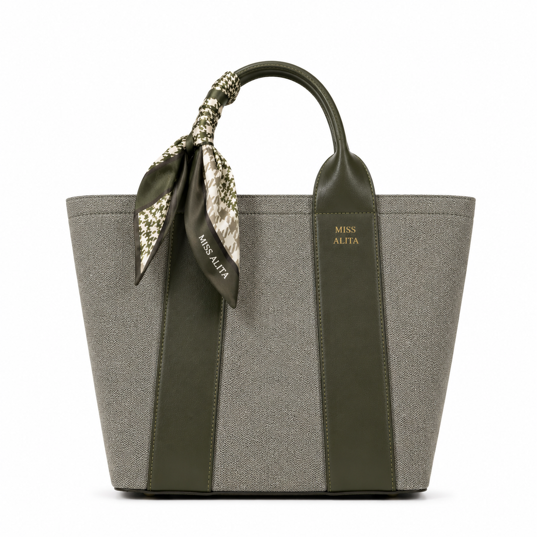 MISS ALITA green canvas tote handbag with olive green leather trim, decorative silk scarf handle, structured design, and gold logo on a white background.