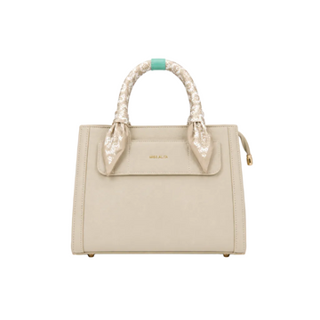MISS ALITA beige structured tote handbag featuring a silk-wrapped top handle, front slip pocket, gold logo, and elegant minimalist design suitable for everyday and office wear.