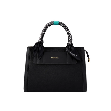 MISS ALITA black structured tote handbag featuring a silk-wrapped top handle, front slip pocket, gold logo, and elegant minimalist design for everyday use.