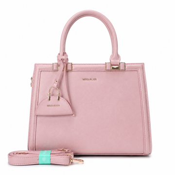 MISS ALITA pink structured top handle handbag with gold-tone hardware, detachable shoulder strap, and matching decorative charm on a white background.