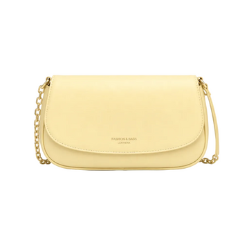 Front view of a light yellow minimalist chain shoulder bag with a smooth leather-look finish, photographed in a professional studio on a clean white background.