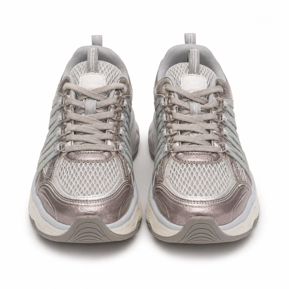 Front view of women's chunky sneakers in white mesh with gray straps and pink glitter metallic overlays.