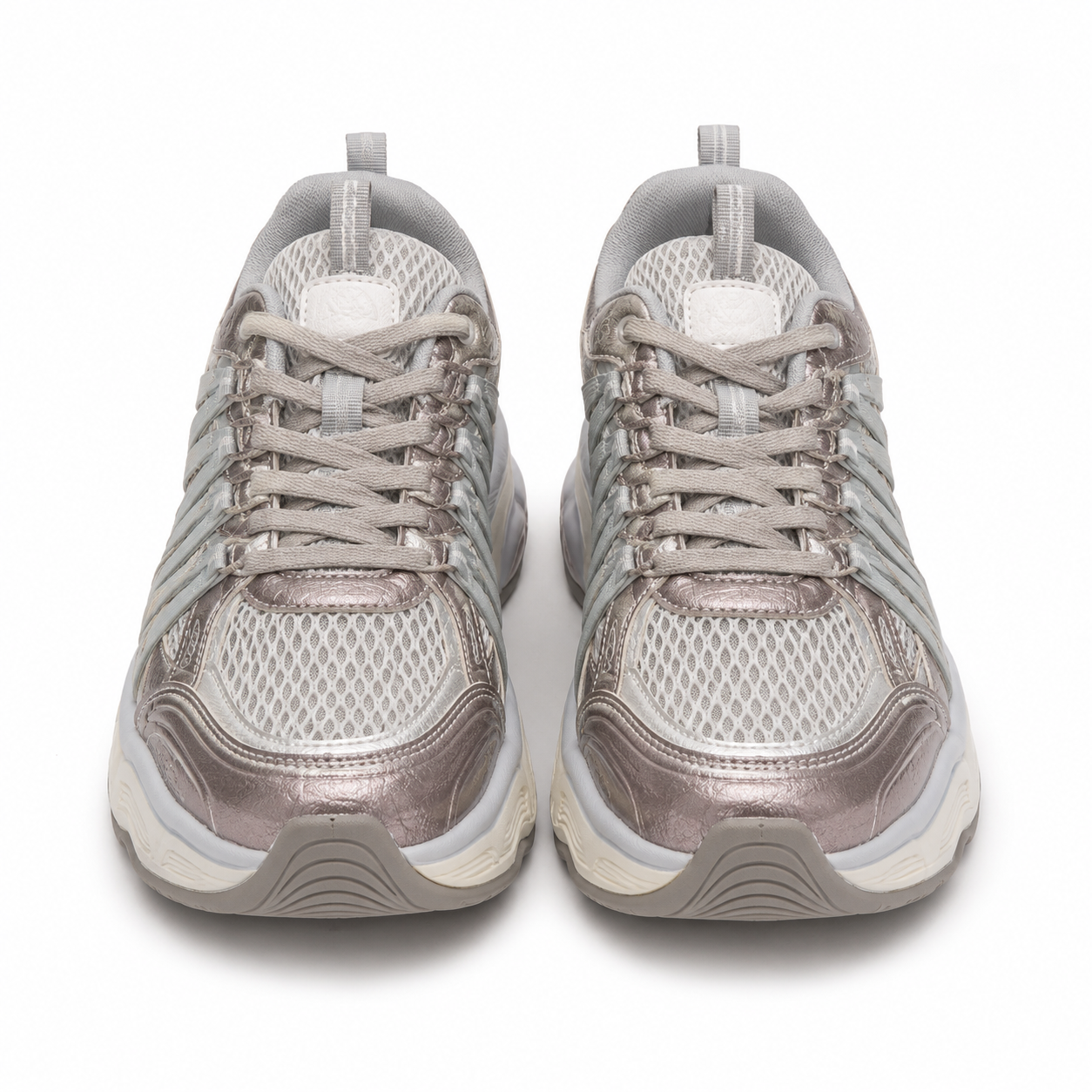 Front view of women's chunky sneakers in white mesh with gray straps and pink glitter metallic overlays.