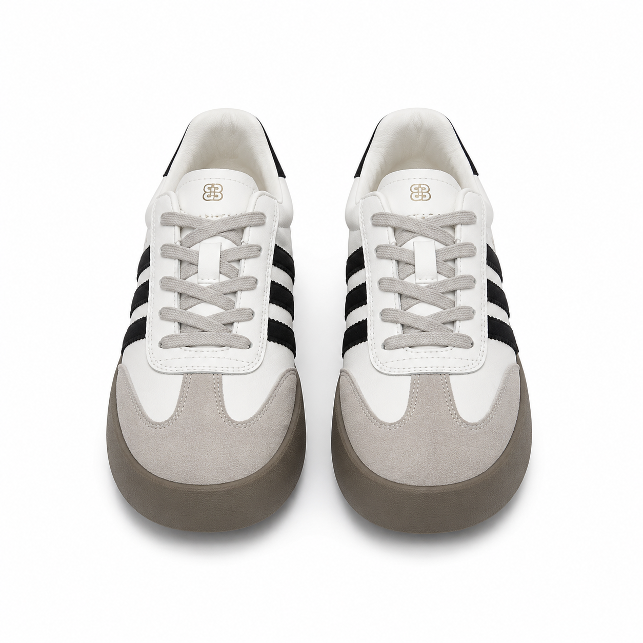 Women's white platform sneakers with black side stripes, gray suede toe cap, thick gray sole, and lace-up design.