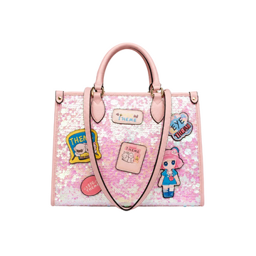 Pink sparkle tote handbag with holographic sequins, decorative cartoon patches, dual top handles, and a detachable shoulder strap.