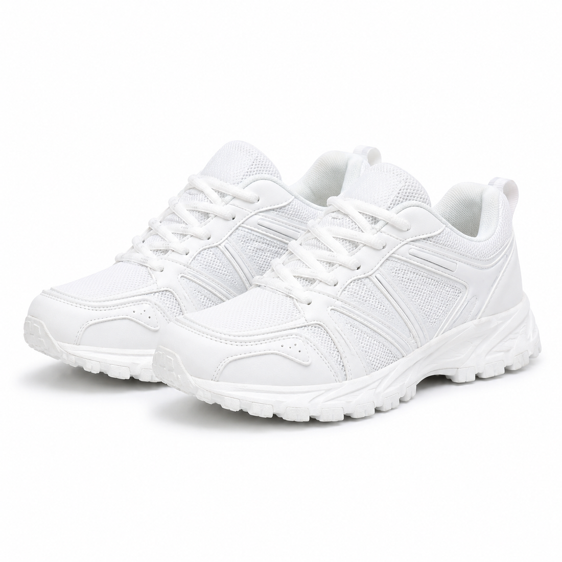 A pair of white athletic sneakers with white laces and thick white soles, shown from a three-quarters angle on a clean white background.