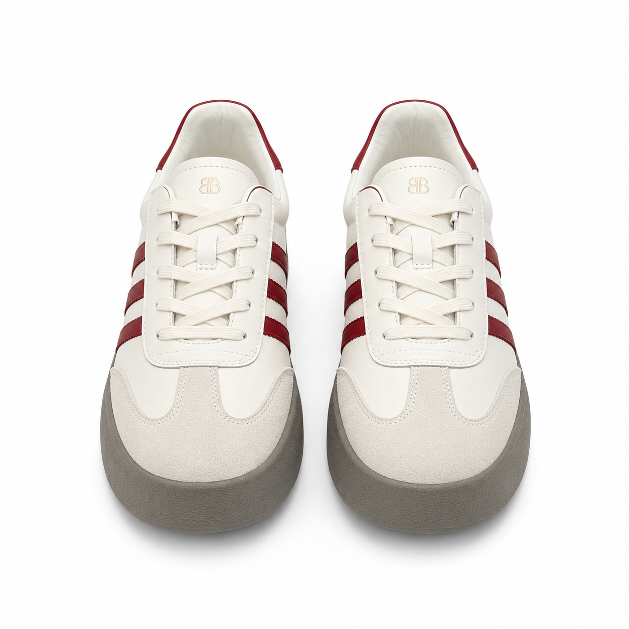A pair of low-top sneakers shown from a top-down view on a white background. The shoes feature an off-white leather and suede upper with three dark red stripes on the sides, a red lining on the collar, and a thick gray sole.
