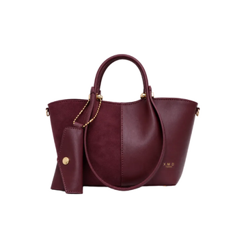 X.M.D women's burgundy two-tone tote bag featuring smooth and suede-like panels, matching wallet, top handles, detachable shoulder strap, and gold-tone hardware for everyday use.